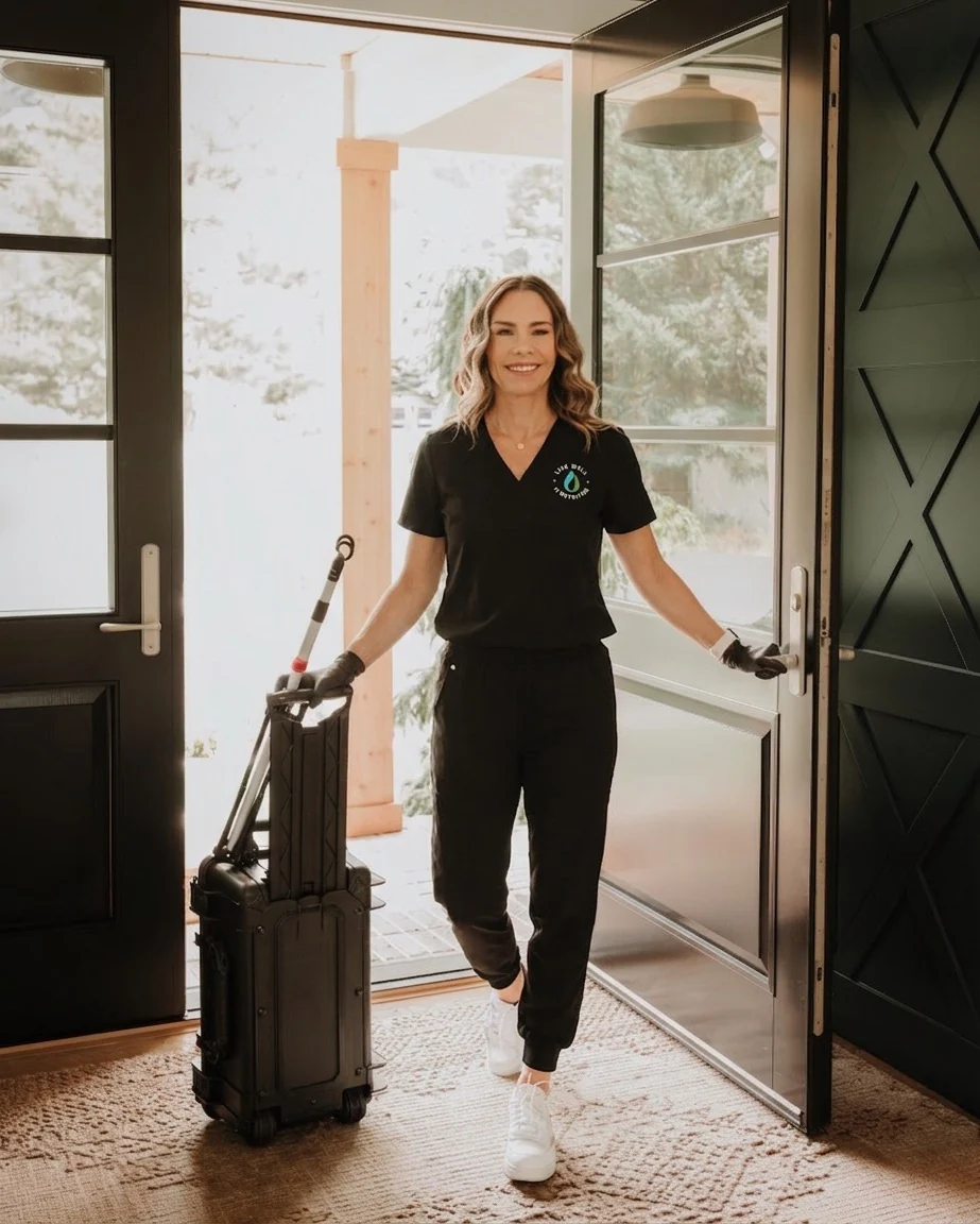 LiveWell IV nurse arriving at a home with a rolling care kit